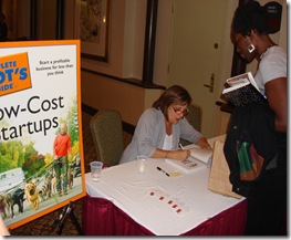 Gail Margolies Reid signing her book at the Decatur Book Festival